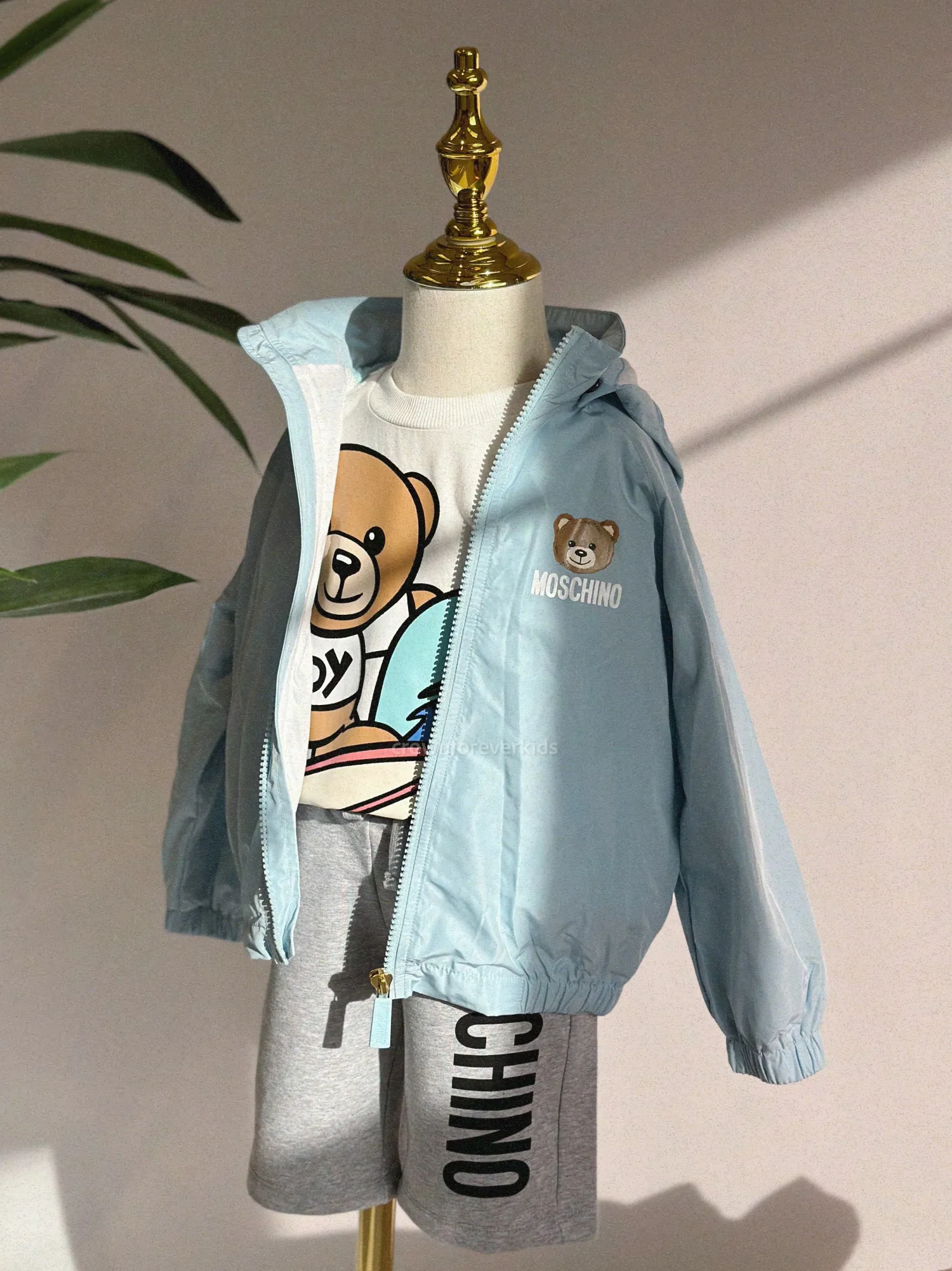 Moschino Jackets> Baby Bear Toy Rattle Hooded Jacket Baby Blue