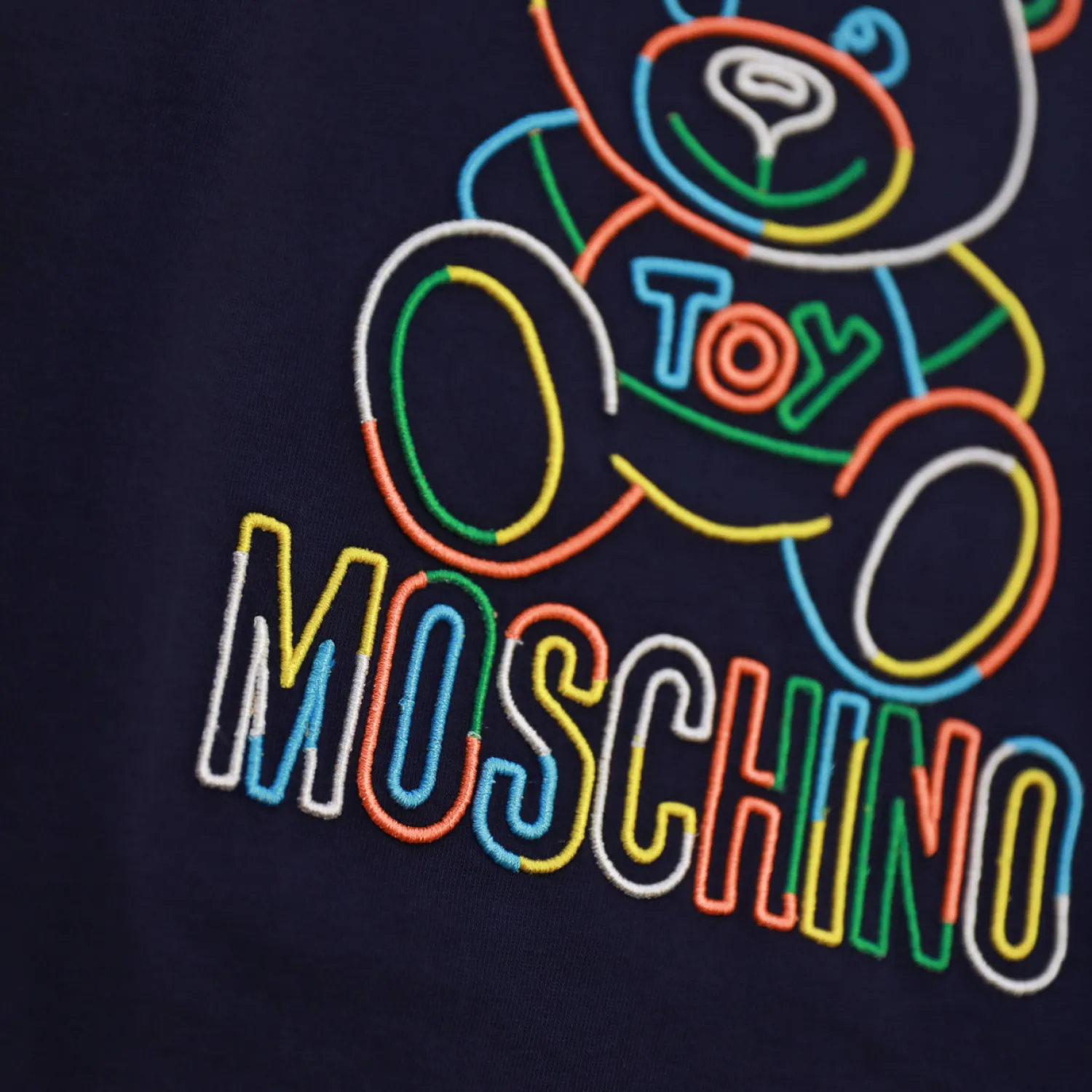 Moschino T Shirts> Baby Rainbow Embroidered Bear T Shirts Navy